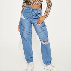 Shock Wave Ripped Cargo Jeans - Light
Blue Wash, Size 3 woman in fashion nova